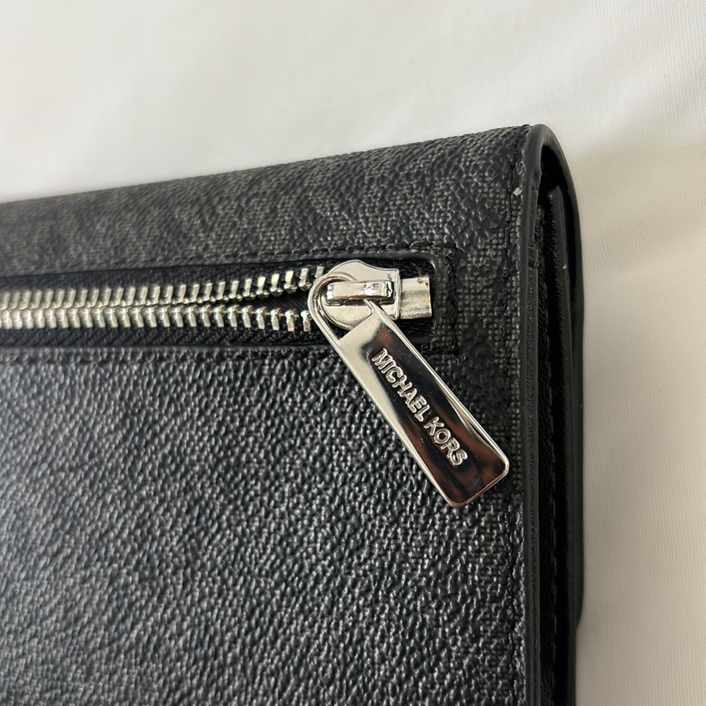 Michael Kors Trifold wallet. Black and gray with silver accents. - Picture 7 of 7